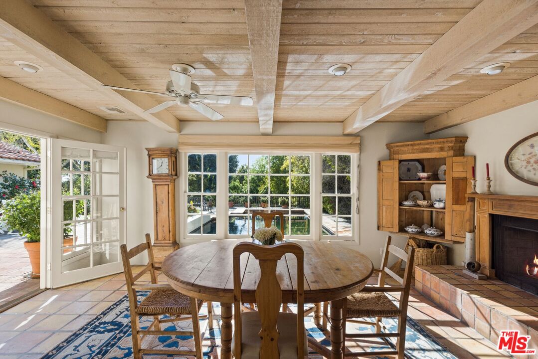 635 North Bonhill Road Los Angeles, CA 90049 - Photo 5 of 19 a view of a dining room with furniture window and outside view