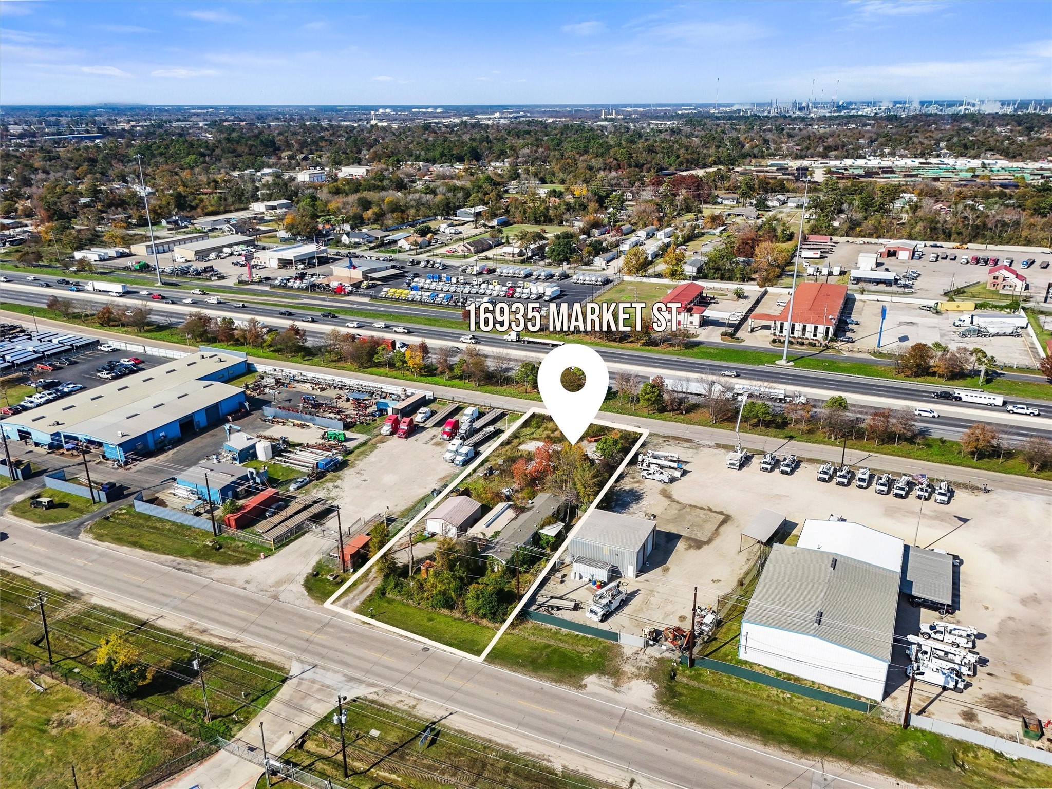16935 Market Street Channelview, TX 77530 - Photo 1 of 13 an aerial view of residential houses with outdoor space
