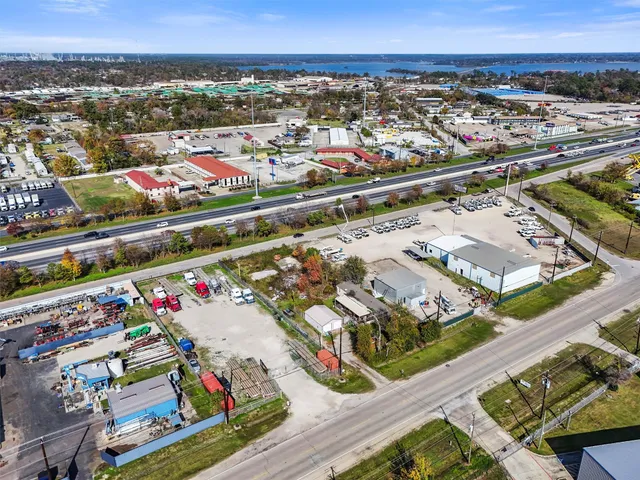 an aerial view of a yard with outdoor seating