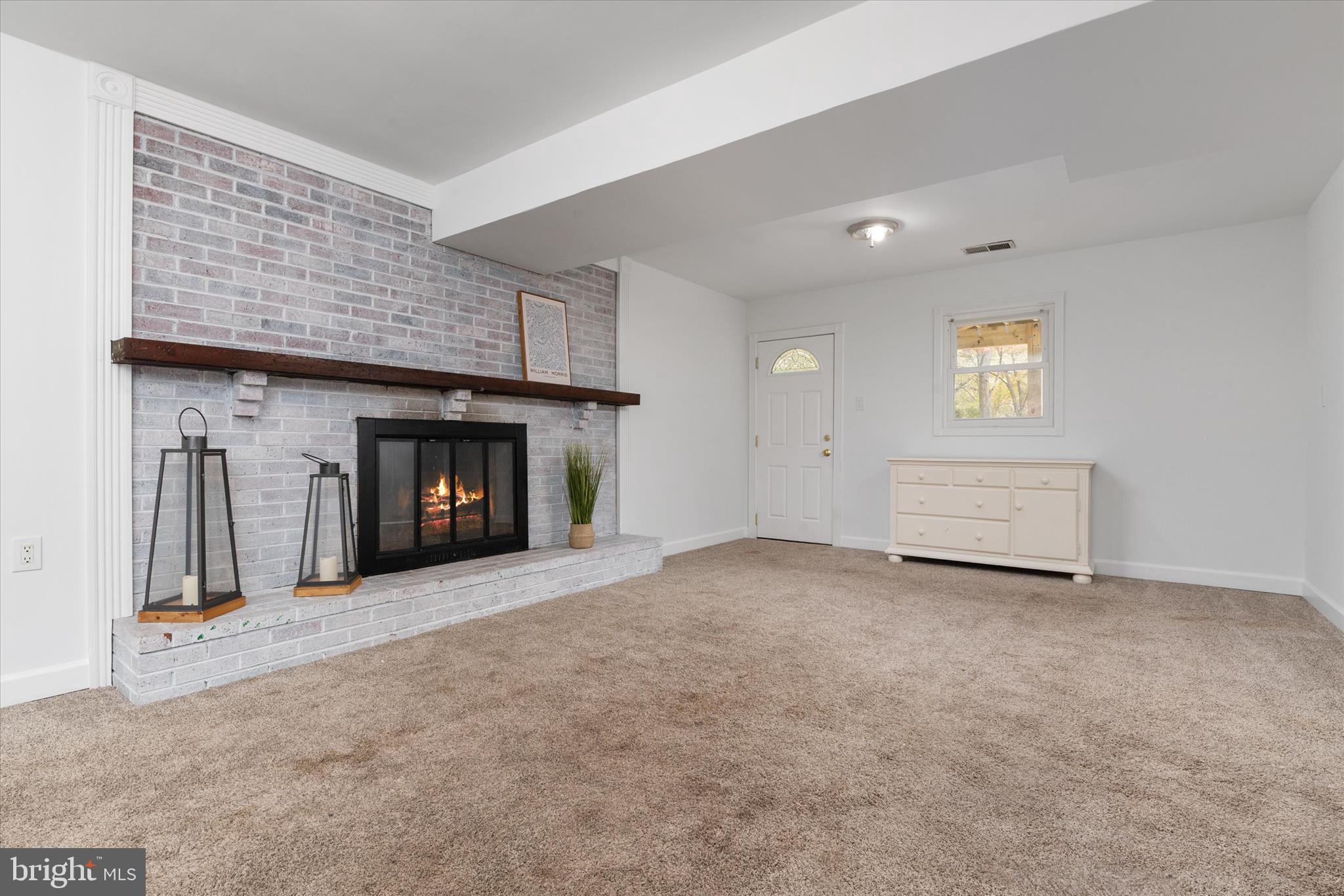 7963 Oak Road Pasadena, MD 21122 - Photo 22 of 53 a view of empty room with a fireplace