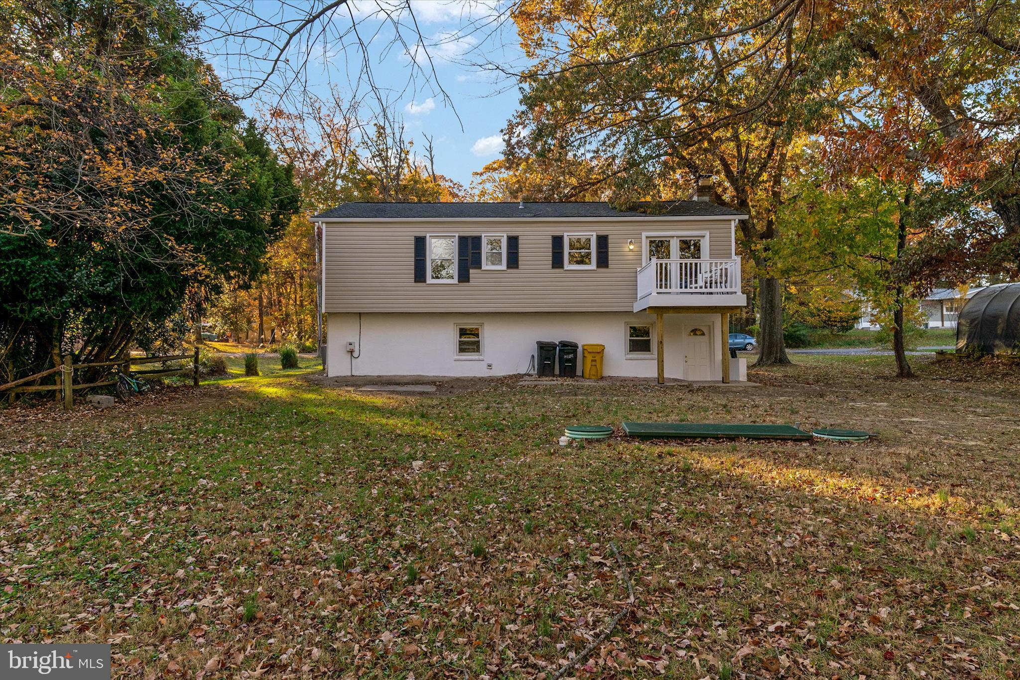 7963 Oak Road Pasadena, MD 21122 - Photo 37 of 53 a front view of a house with a yard