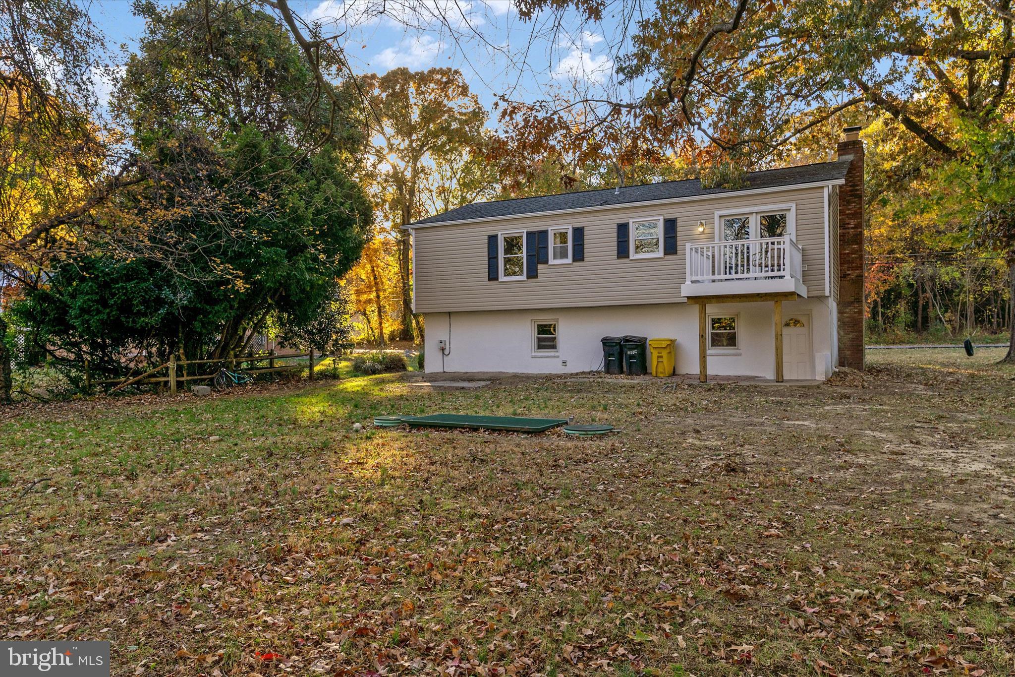 7963 Oak Road Pasadena, MD 21122 - Photo 38 of 53 a front view of a house with a yard