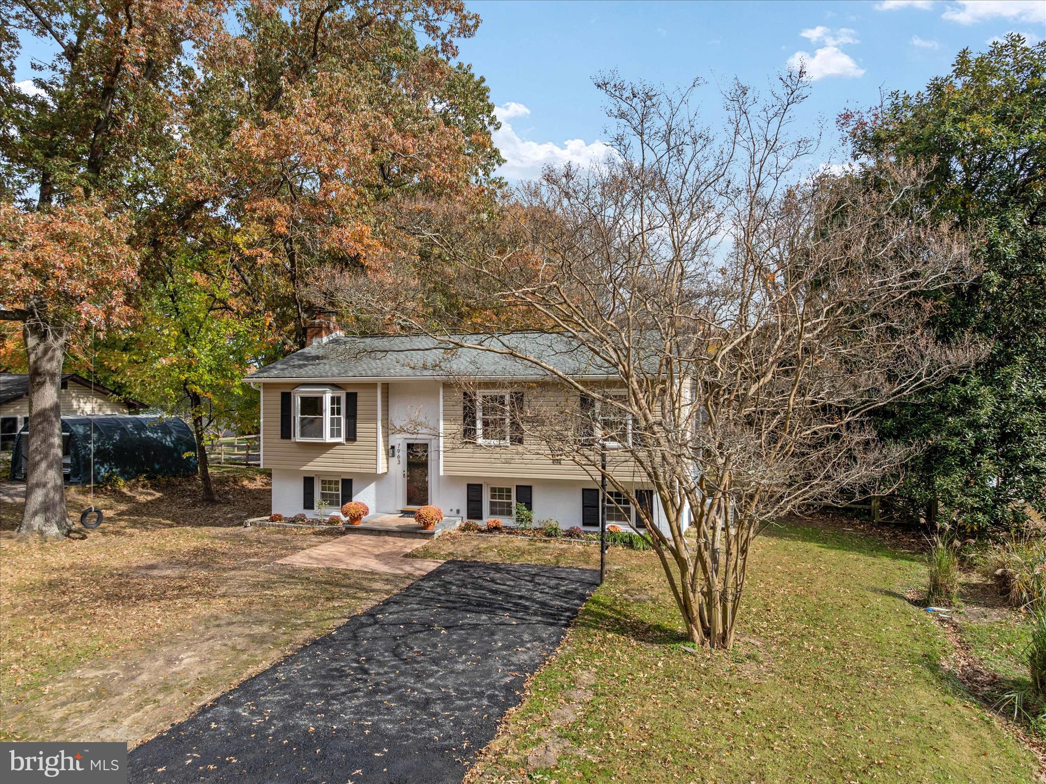 7963 Oak Road Pasadena, MD 21122 - Photo 50 of 53 a front view of a house with a yard