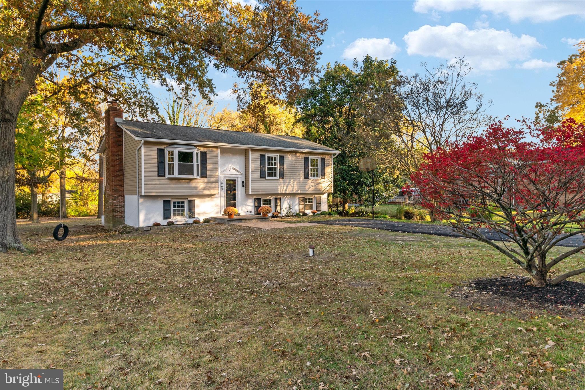 7963 Oak Road Pasadena, MD 21122 - Photo 52 of 53 a view of a house with a yard