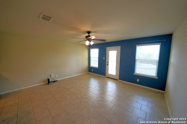 12316 Erstein Valley Schertz, TX 78154 - Photo 12 of 50 a view of an empty room with a window
