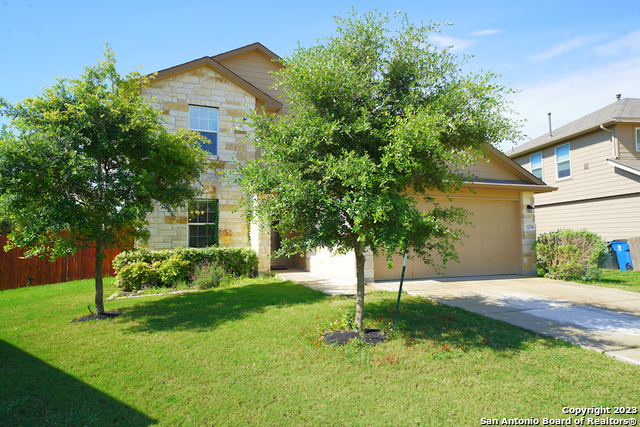 12316 Erstein Valley Schertz, TX 78154 - Photo 2 of 50 a view of a house with a yard and a garden