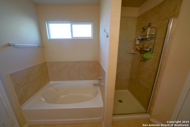 12316 Erstein Valley Schertz, TX 78154 - Photo 23 of 50 a bathroom with a bathtub