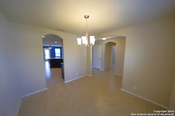 an empty room that has a window