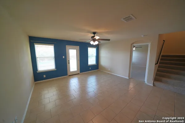 a view of a livingroom with a kitchen