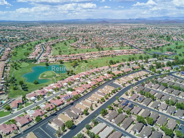 an aerial view of a city with lots of residential buildings