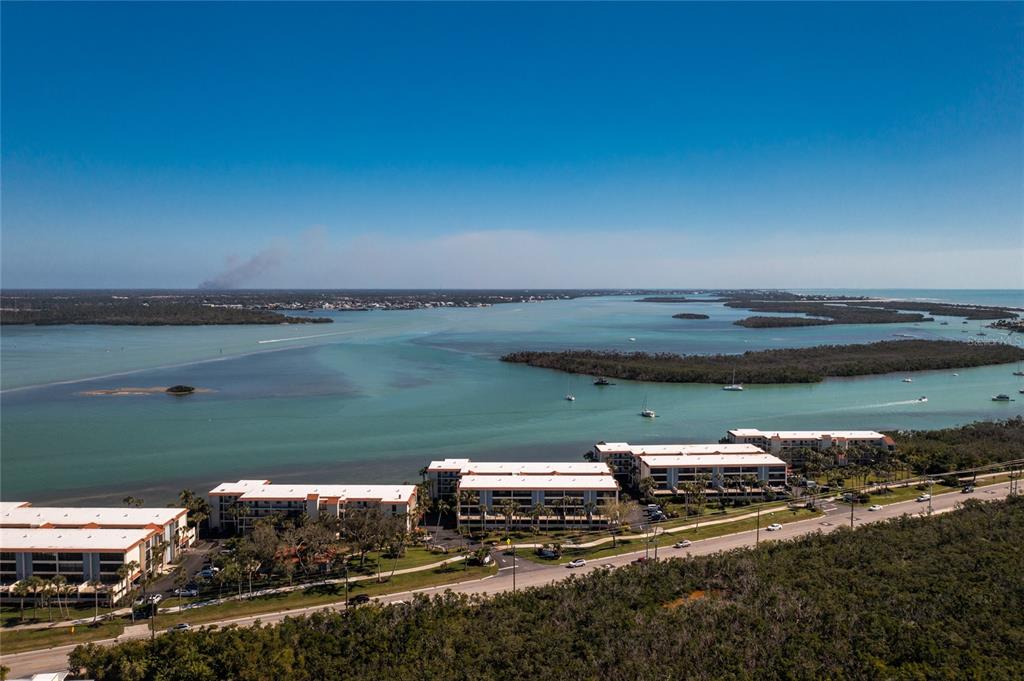 1651 Beach Road, Unit 212 Englewood, FL 34223 - Photo 33 of 50 a view of a lake with a outdoor space