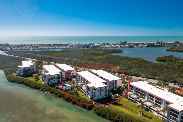 a view of a swimming pool with a lounge chairs