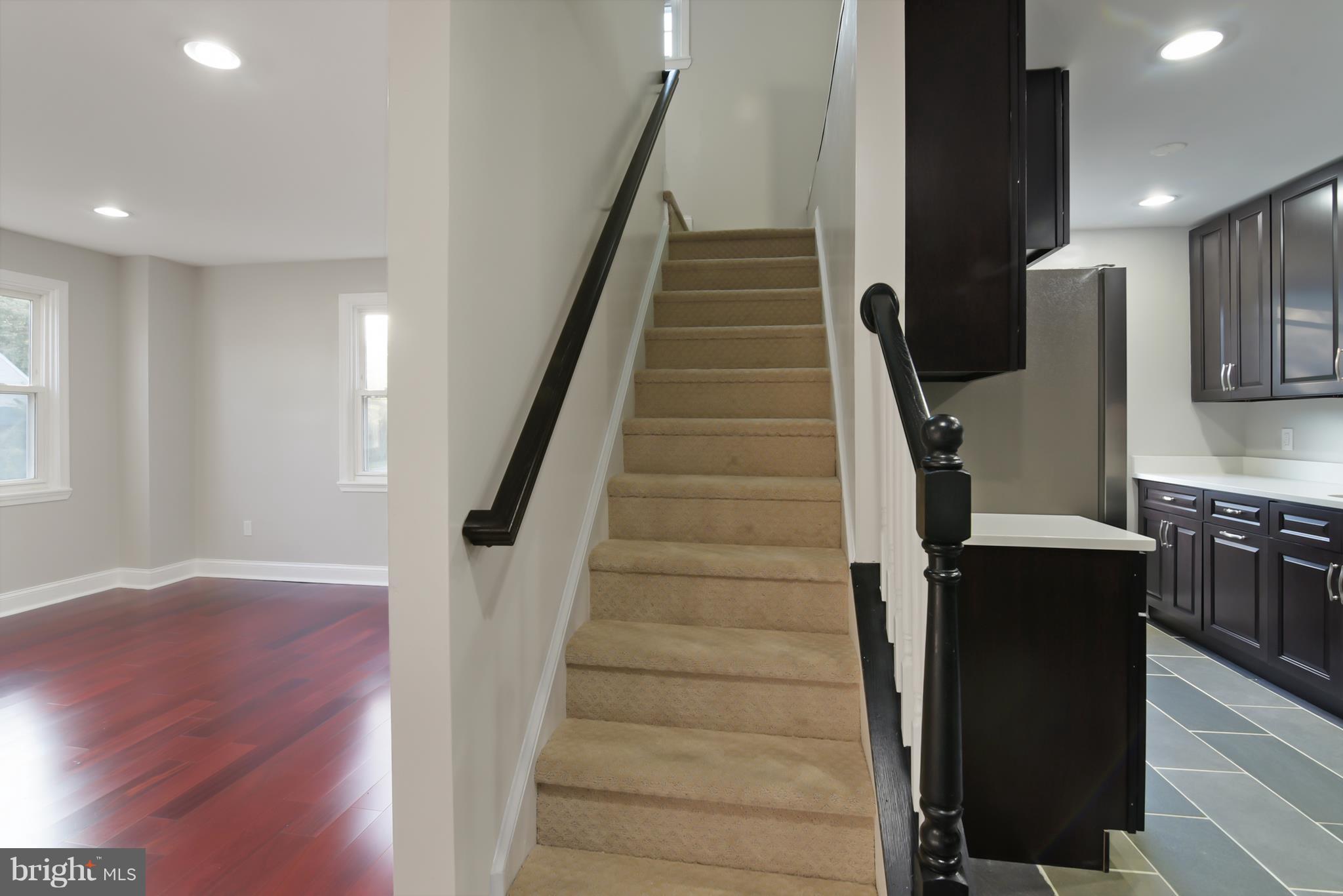 7116 Marston Road Baltimore, MD 21207 - Photo 7 of 30 a view of entryway and hall with wooden floor