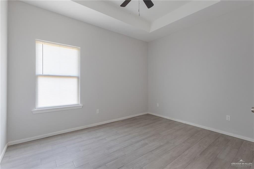 340 Eva Street, Unit 3 Edcouch, TX 78538 - Photo 12 of 12 an empty room with a window