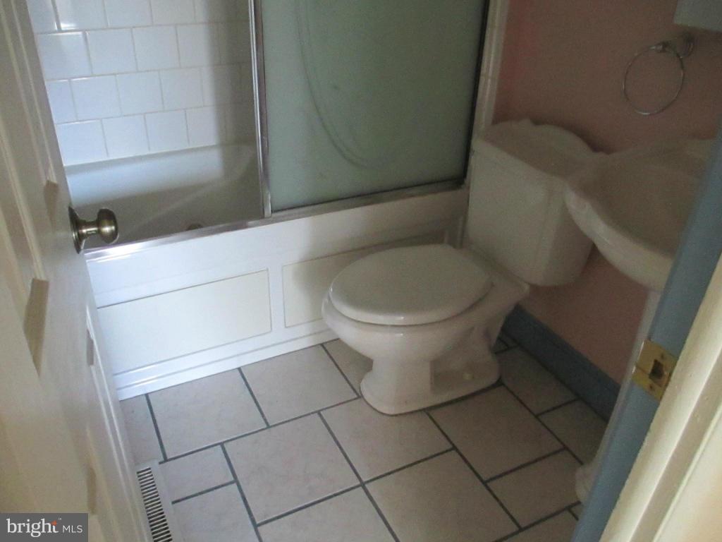 400 Laburnum Road Edgewood, MD 21040 - Photo 11 of 23 a bathroom with a toilet and a shower