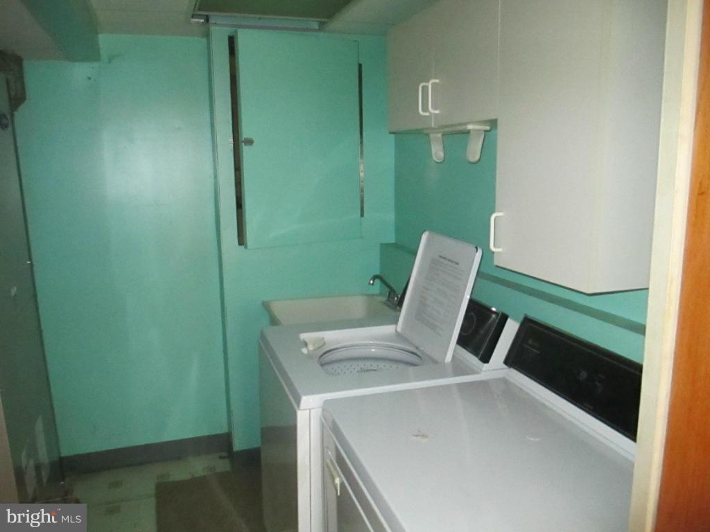 400 Laburnum Road Edgewood, MD 21040 - Photo 22 of 23 a view of storage and utility room with washer and dryer