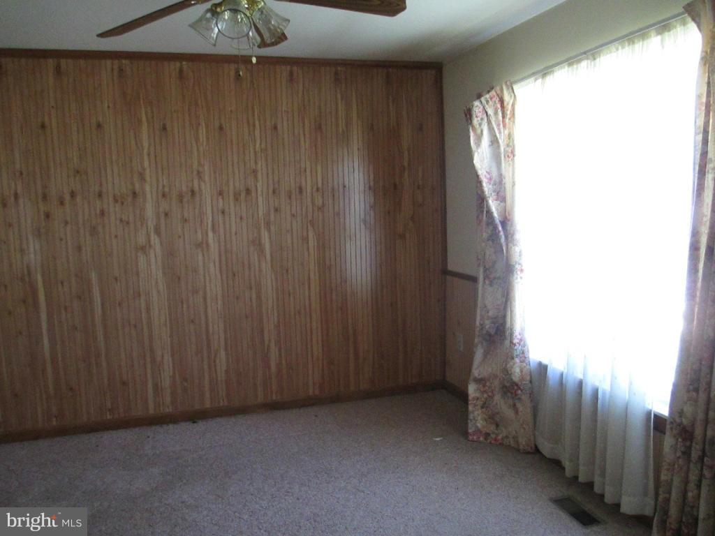 400 Laburnum Road Edgewood, MD 21040 - Photo 7 of 23 a view of a room with a wooden door