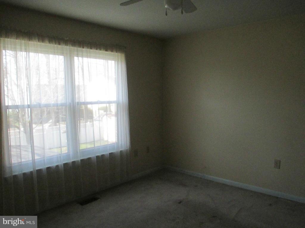 400 Laburnum Road Edgewood, MD 21040 - Photo 9 of 23 an empty room with a window
