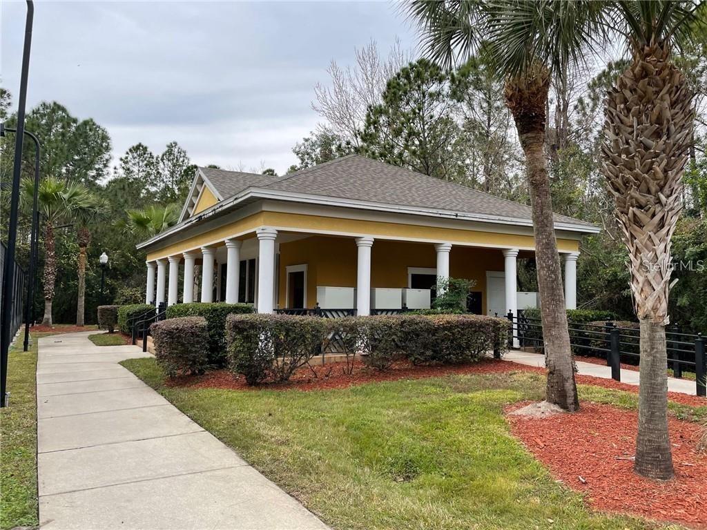 3611 Conroy Road, Unit 825 Orlando, FL 32839 - Photo 20 of 27 a front view of a house with garden