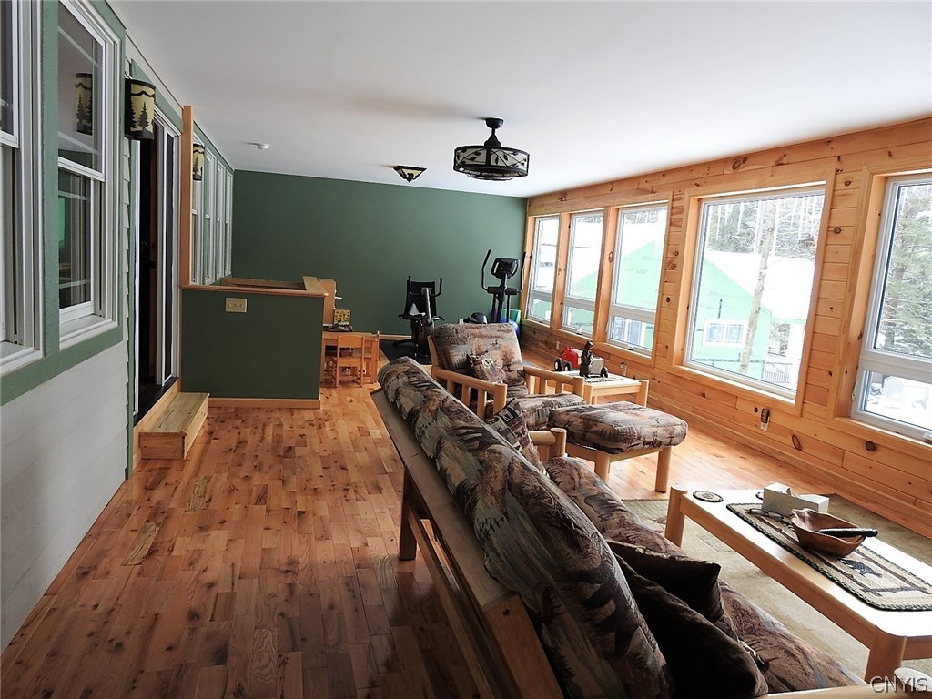 5771 Long Point Road Brantingham, NY 13312 - Photo 17 of 49 Day Room, Living area, Direct access to side sitti