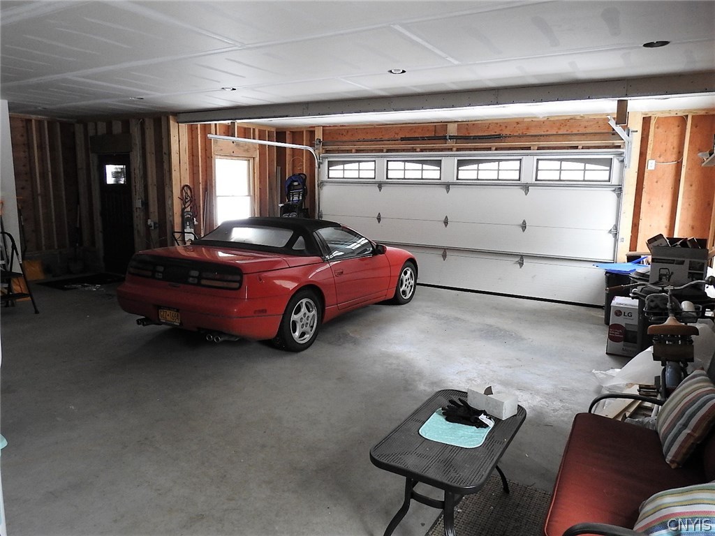5771 Long Point Road Brantingham, NY 13312 - Photo 37 of 49 Could fit two cars, Large closet under the stairs