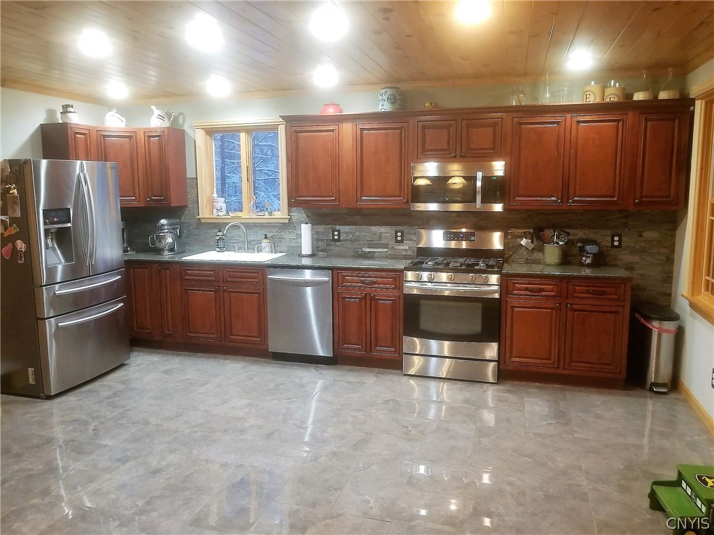 5771 Long Point Road Brantingham, NY 13312 - Photo 4 of 49 Stainless Appliances with Porcelain Floors, Stone