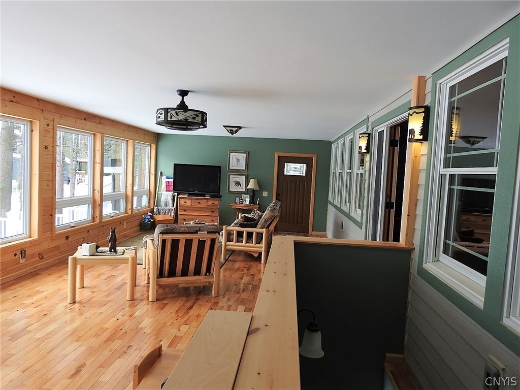 5771 Long Point Road Brantingham, NY 13312 - Photo 6 of 49 Porch Enclosed and updated for year round use. Doo