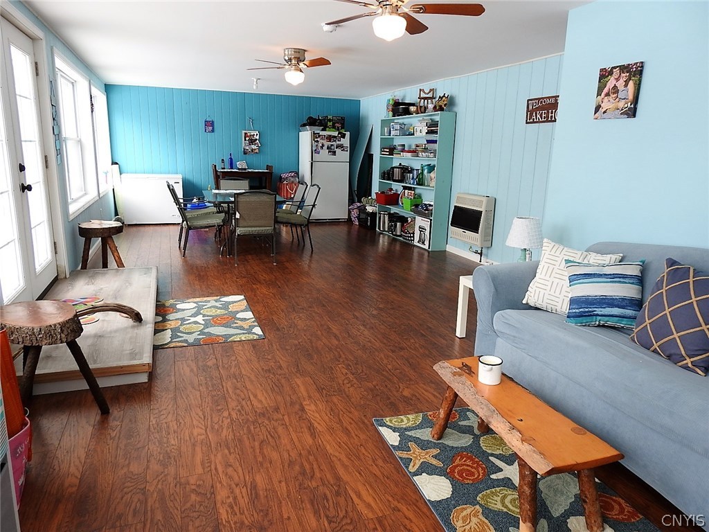 5771 Long Point Road Brantingham, NY 13312 - Photo 7 of 49 The bottom half of the porch, half bath here, insu