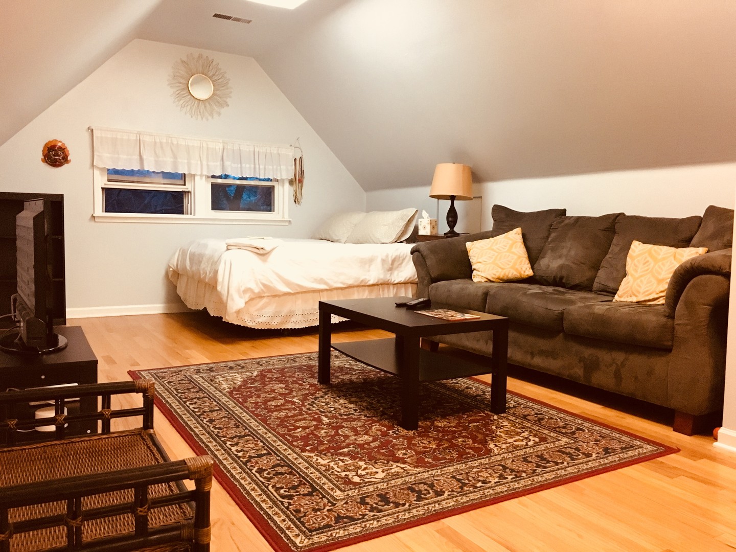 4154 North Campbell Avenue Chicago, IL 60618 - Photo 20 of 28 a living room with furniture and a flat screen tv