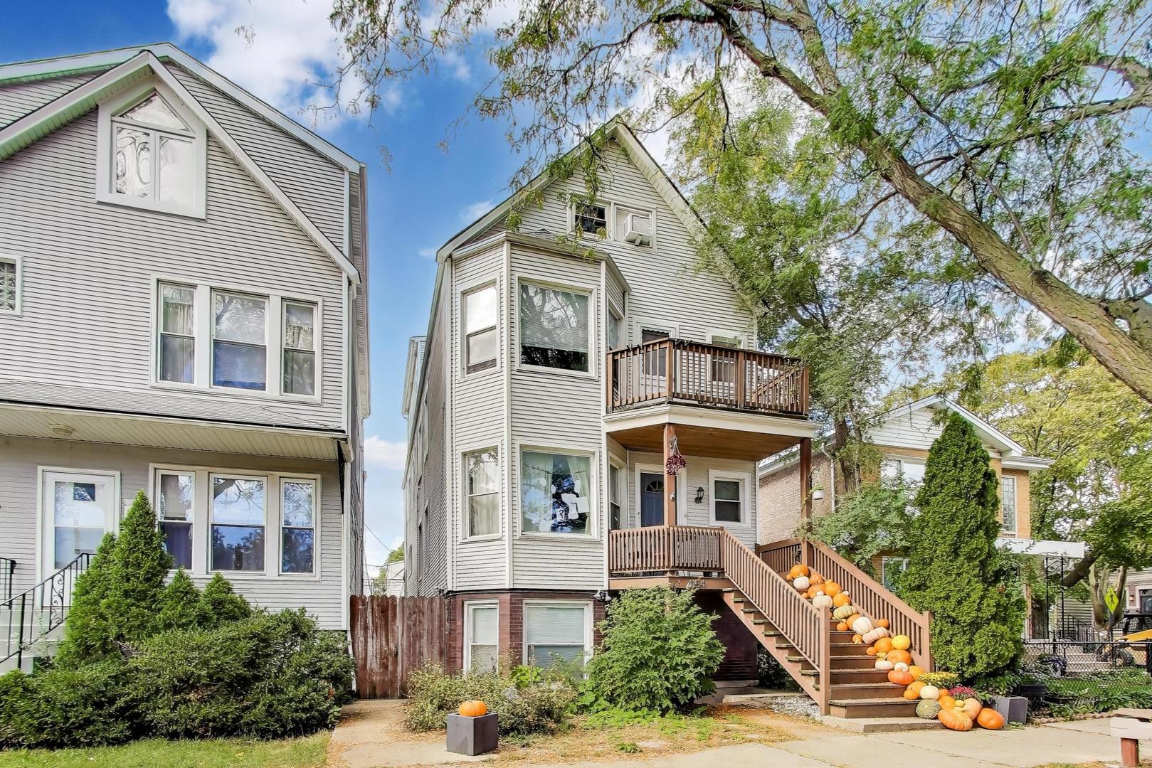 4154 North Campbell Avenue Chicago, IL 60618 - Photo 2 of 28 front view of house with a street