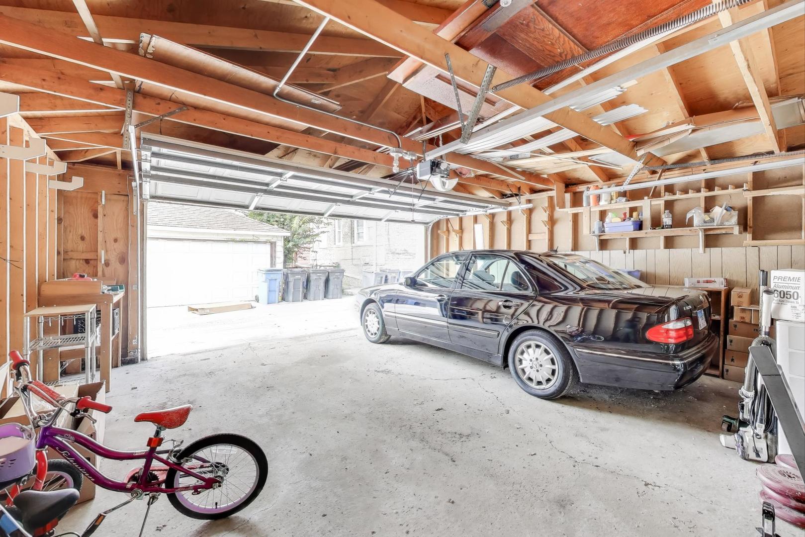 4154 North Campbell Avenue Chicago, IL 60618 - Photo 28 of 28 a car parked in a garage