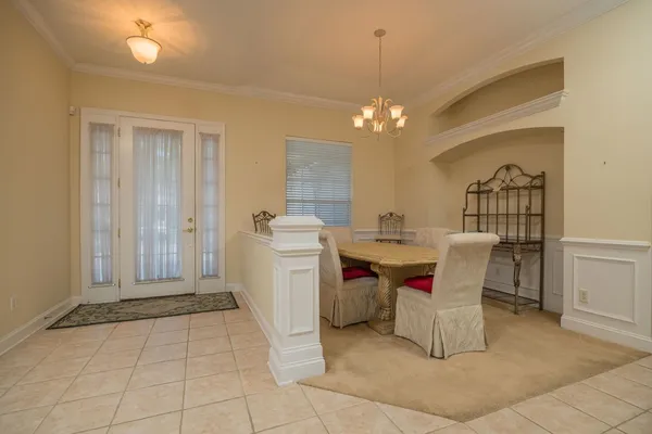 a large kitchen with stainless steel appliances granite countertop a sink and cabinets