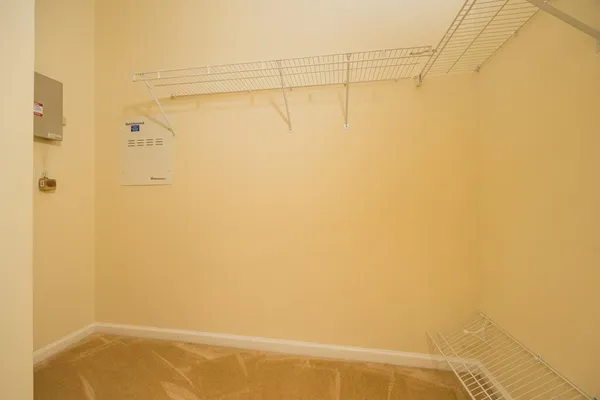 a view of empty room with windows