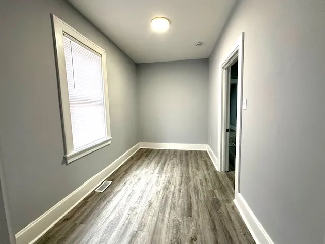 a kitchen with stainless steel appliances a stove a sink and a refrigerator