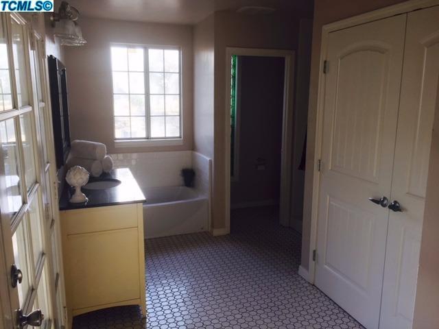 355 South Cornucopia Road Exeter, CA 93221 - Photo 15 of 26 a kitchen with a refrigerator and window