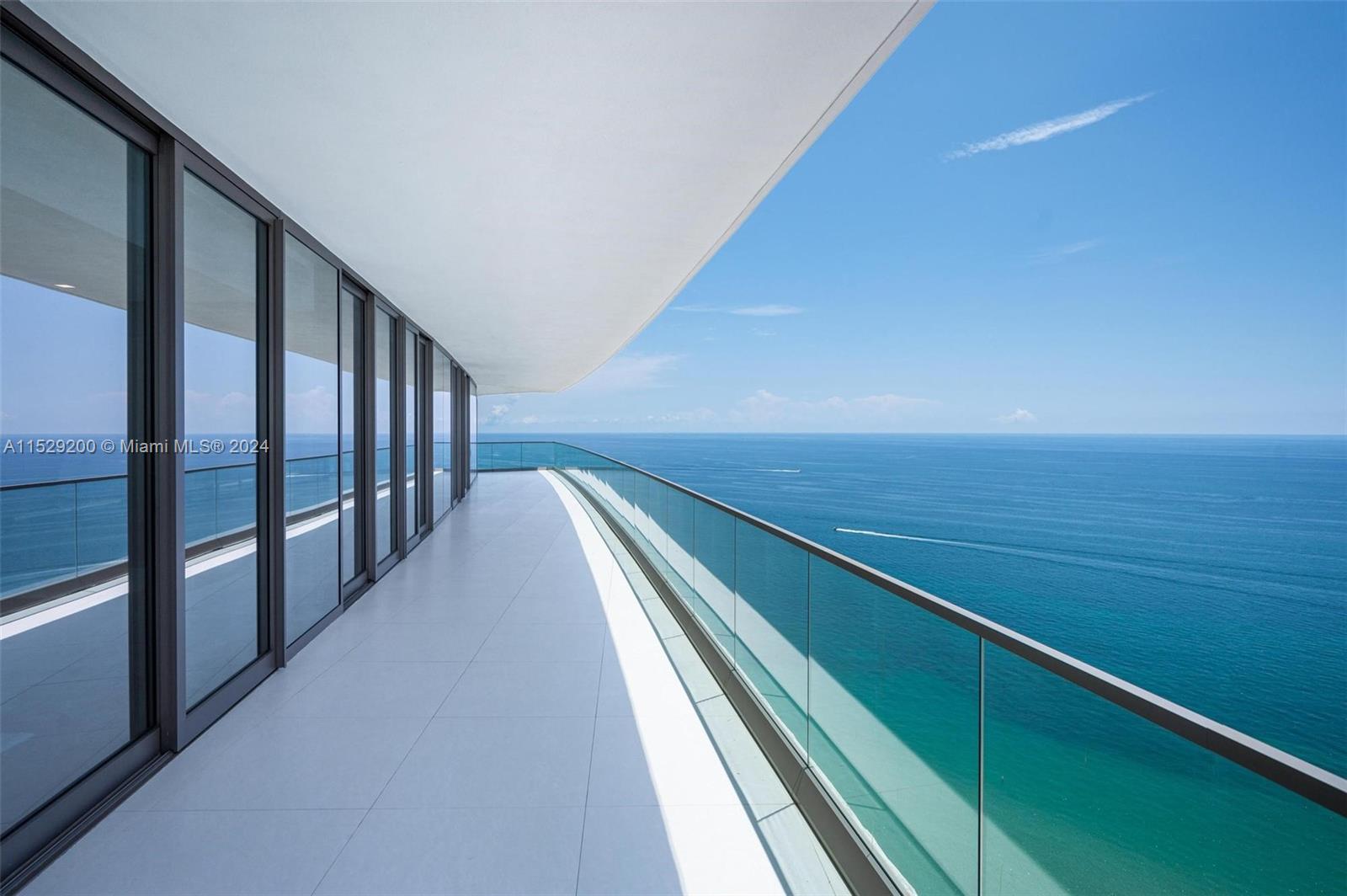 a view of balcony with ocean