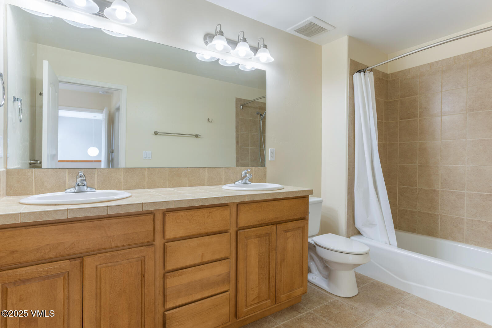 60 Mill Road, Unit J1 Eagle, CO 81631 - Photo 16 of 31 a bathroom with a sink a toilet and a bathtub