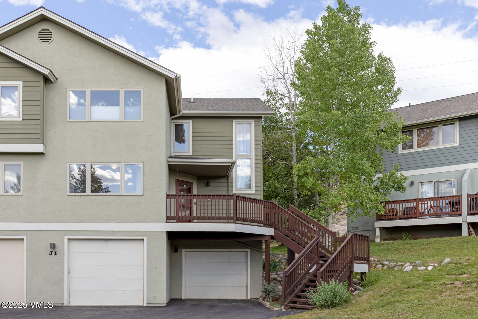 60 Mill Road, Unit J1 Eagle, CO 81631 - Photo 28 of 31 a front view of a house with garden