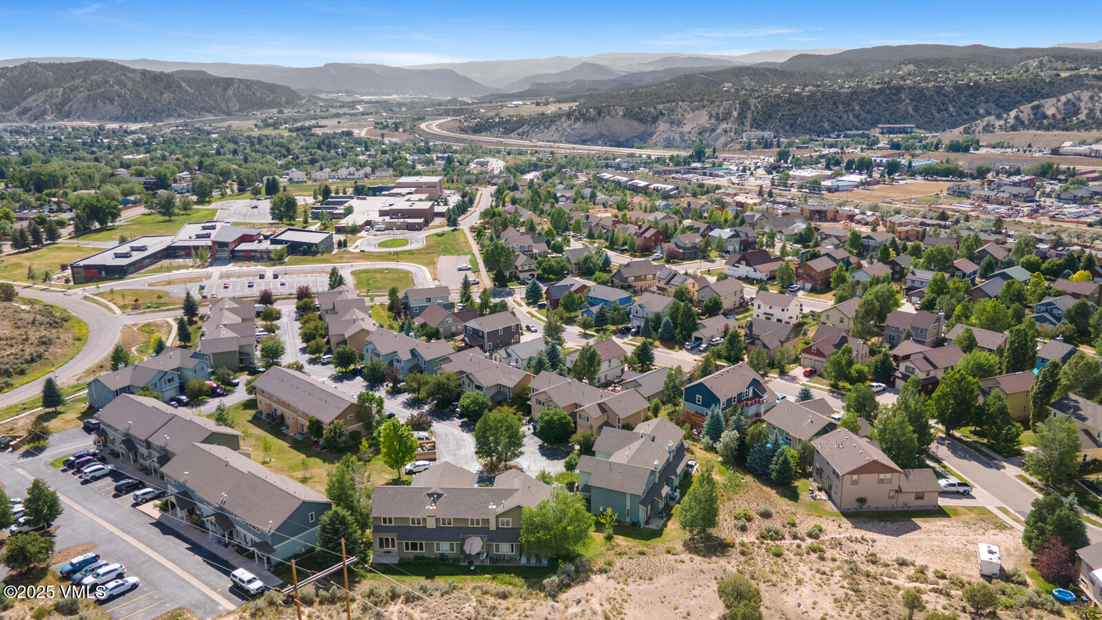 60 Mill Road, Unit J1 Eagle, CO 81631 - Photo 31 of 31 an aerial view of a city with lots of residential buildings