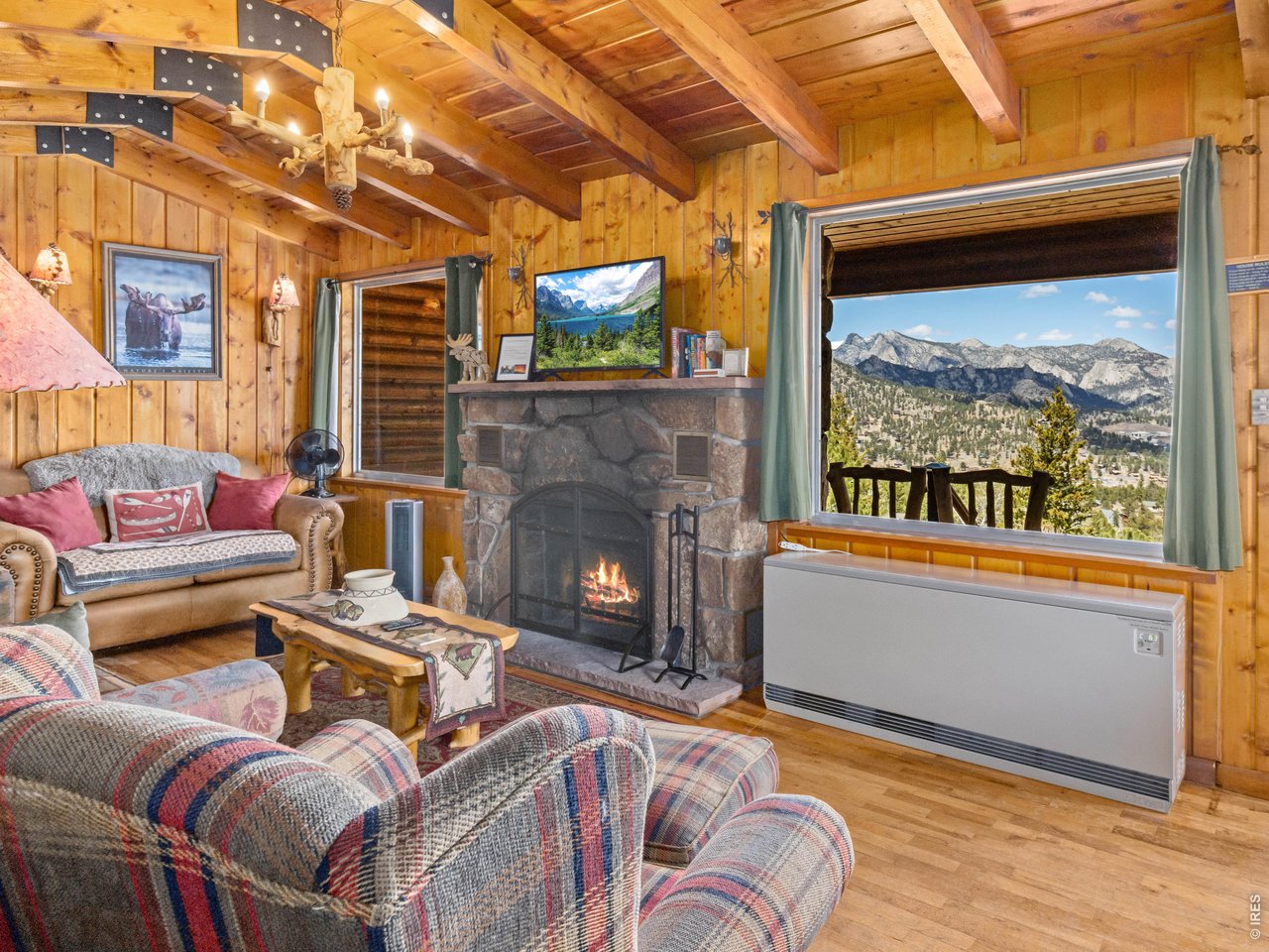 1251 Giant Track Road Estes Park, CO 80517 - Photo 9 of 29 Living room w/fire place