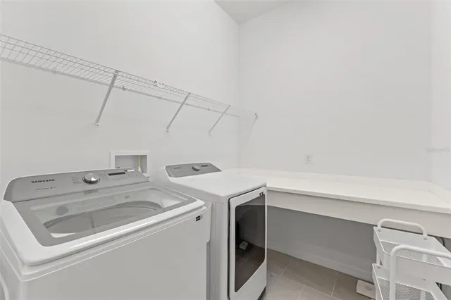 a bathroom with 2 sink and a mirror