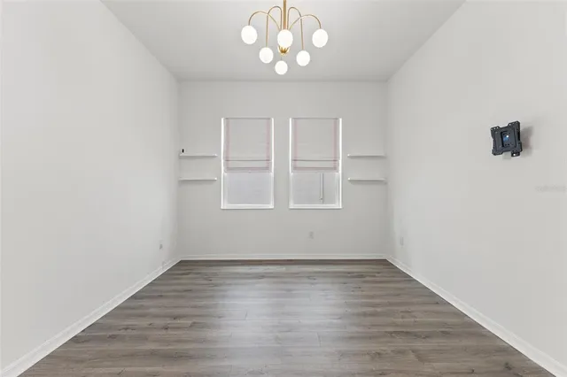 wooden floor in an empty room with a empty space