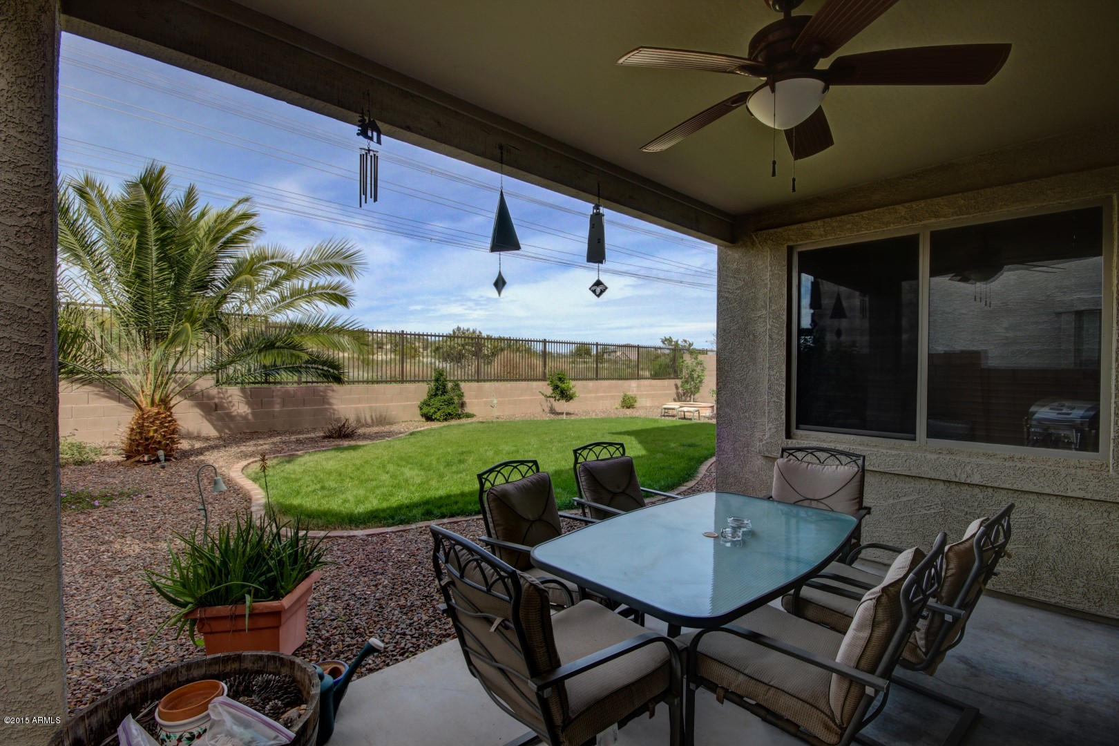 2538 East Ridge Creek Road Phoenix, AZ 85024 - Photo 46 of 53 Backyard patio and grass play area