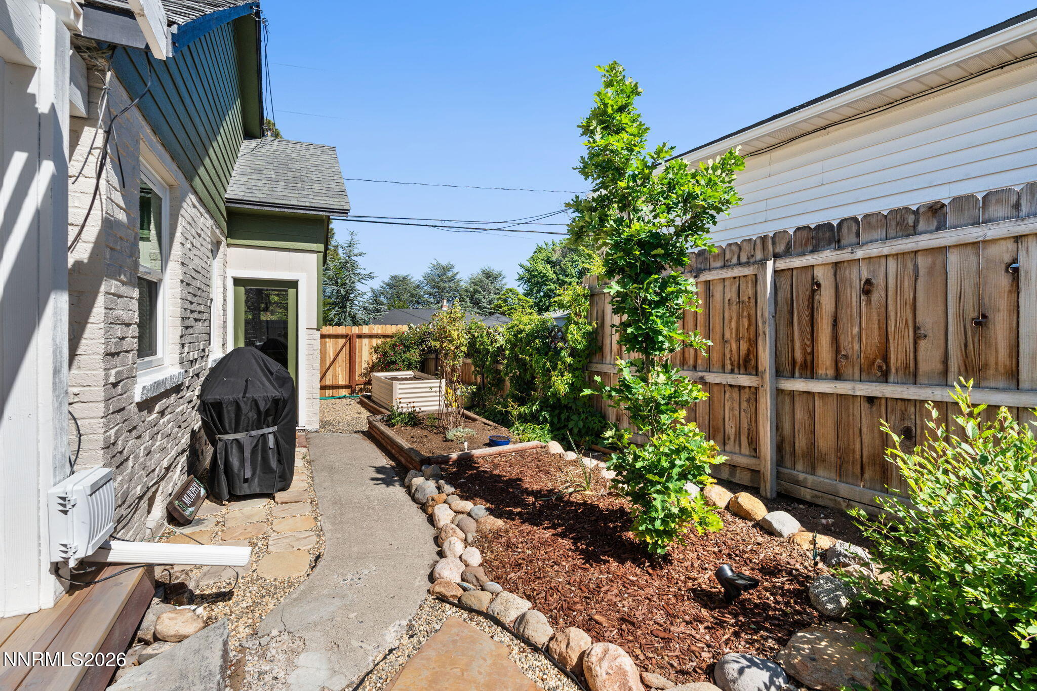 300 Country Club Drive Reno, NV 89509 - Photo 35 of 48 a view of a house with backyard and sitting area
