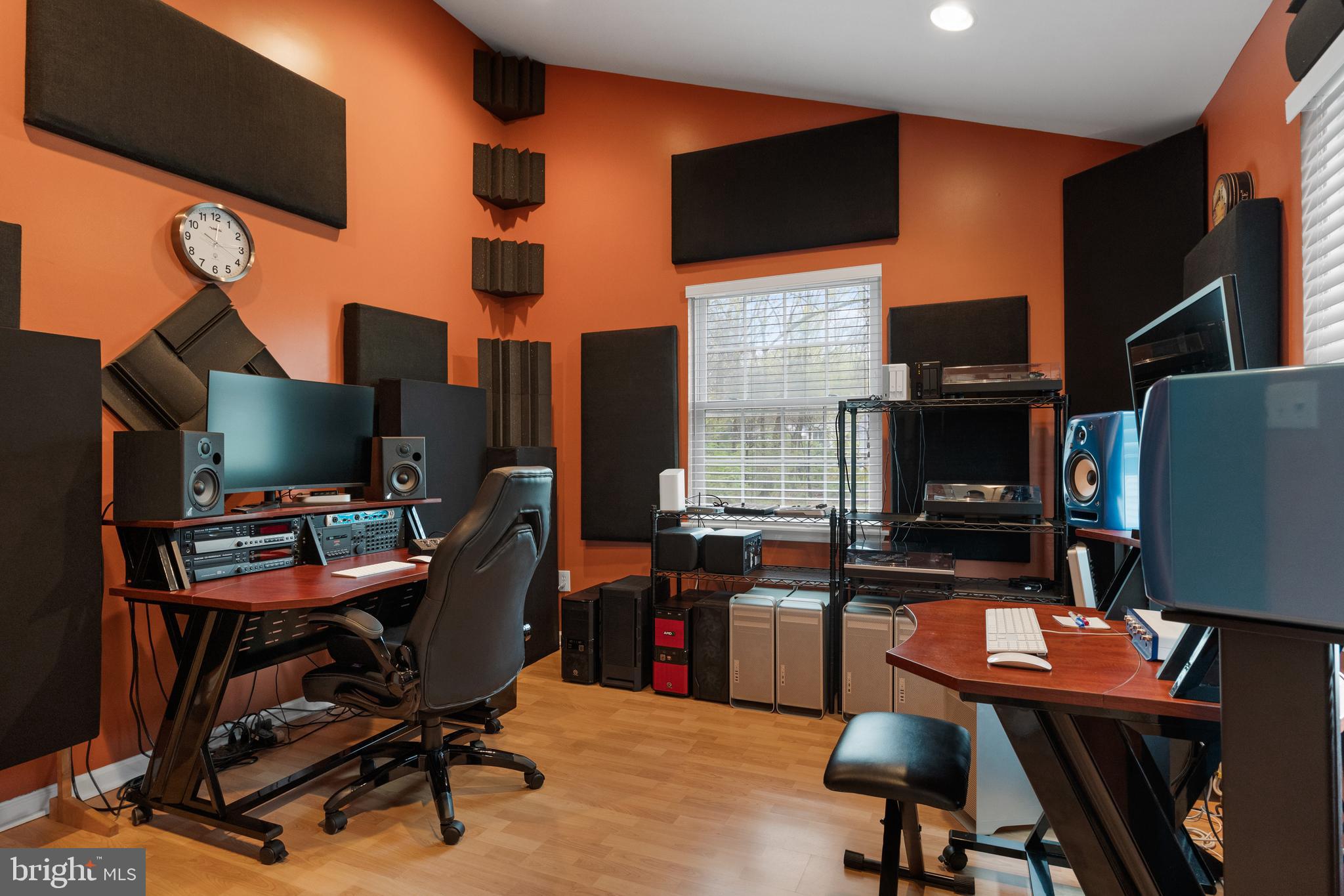 179 Forge Road Delran, NJ 08075 - Photo 18 of 35 a view of a workspace with furniture and a flat screen tv