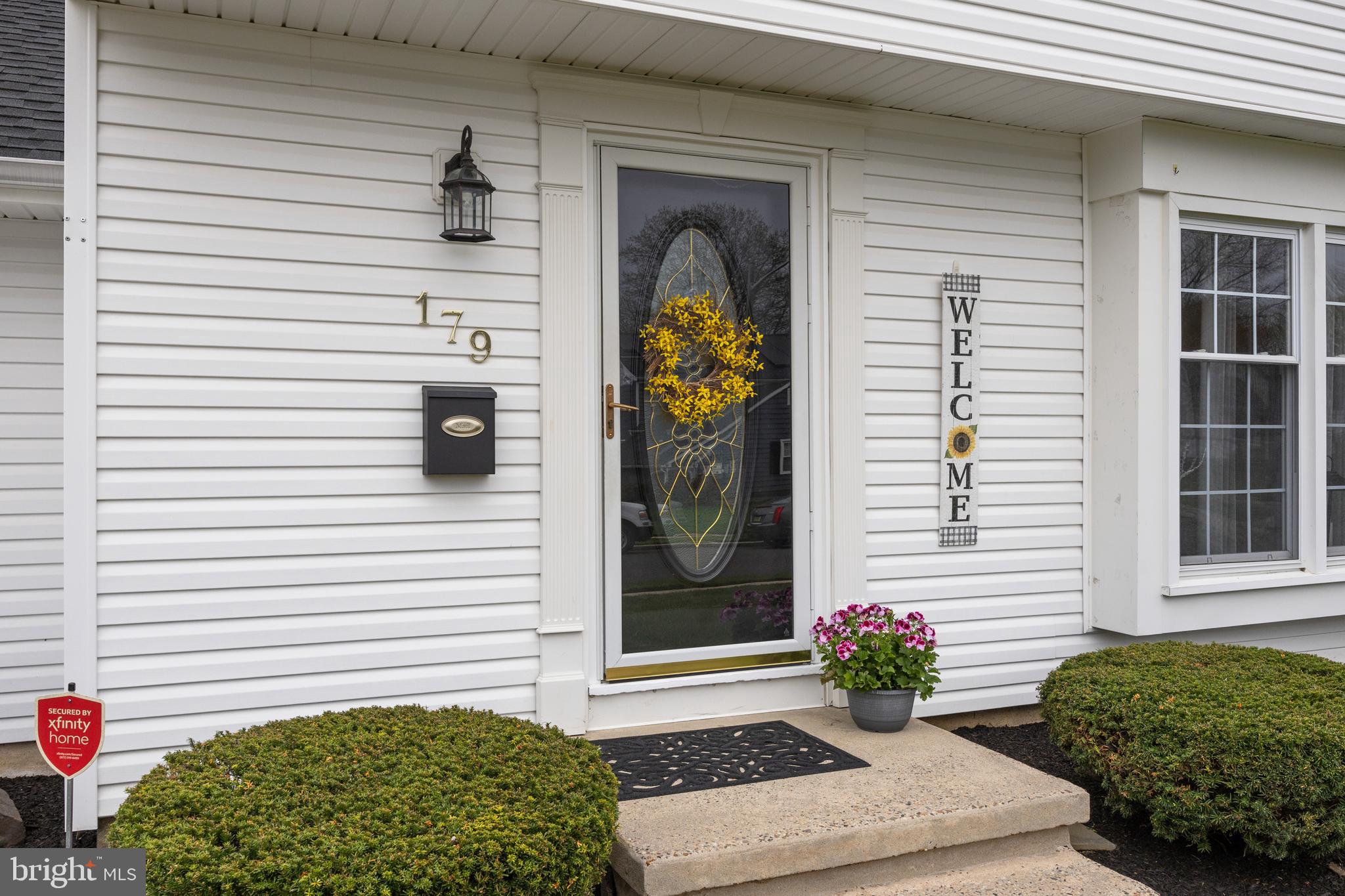 179 Forge Road Delran, NJ 08075 - Photo 4 of 35 a potted plant sitting in front of a house