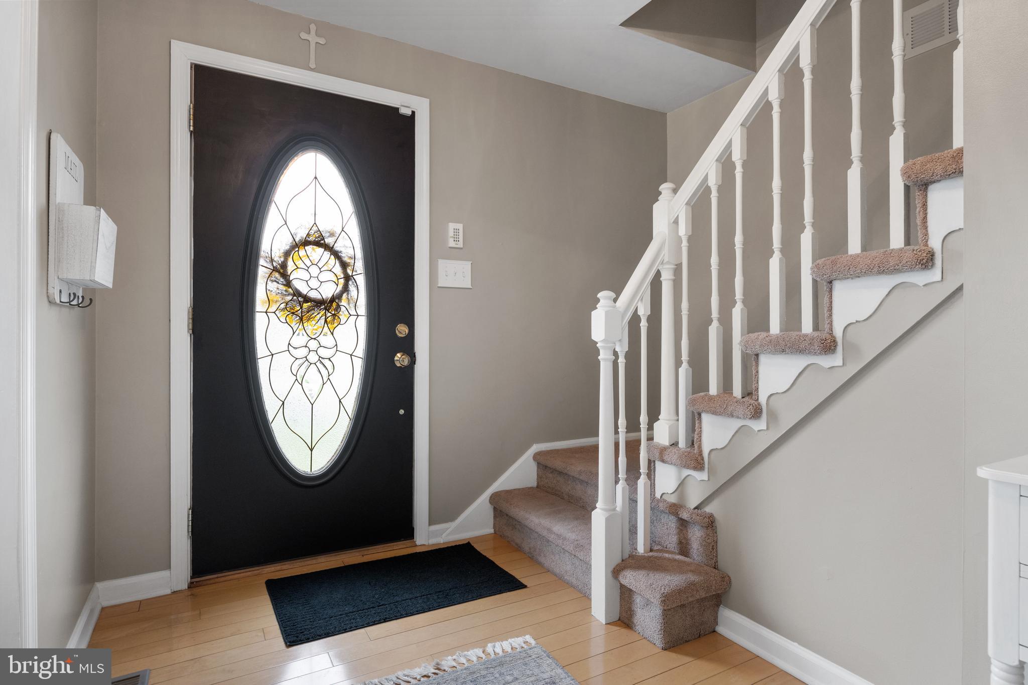 179 Forge Road Delran, NJ 08075 - Photo 5 of 35 a view of entryway with wooden floor and window