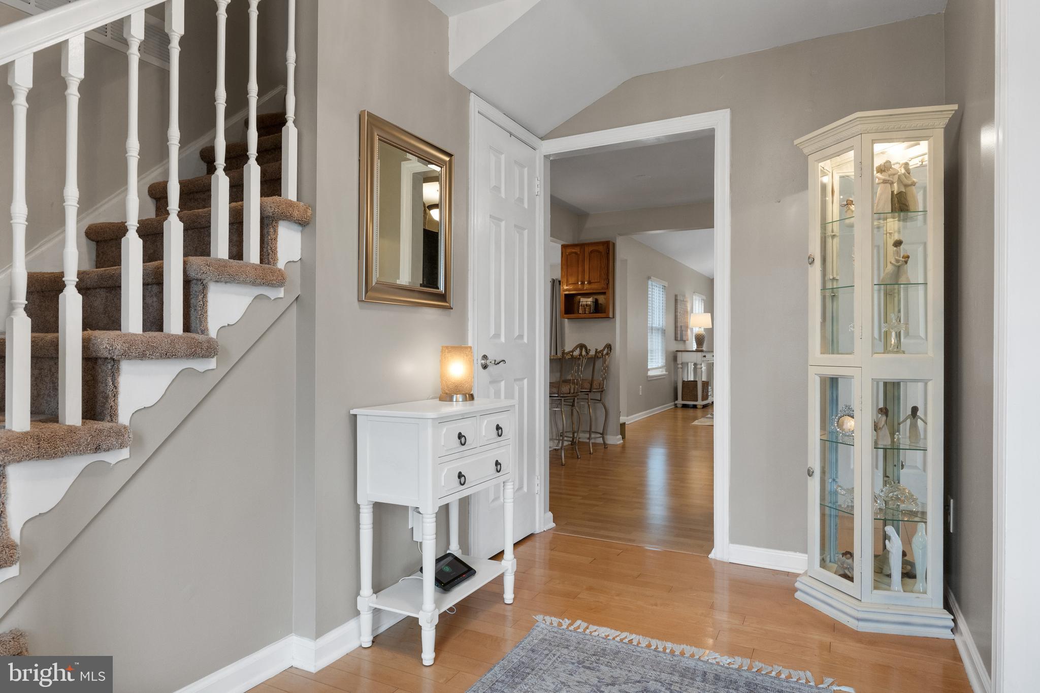 179 Forge Road Delran, NJ 08075 - Photo 6 of 35 a view of entryway with livingroom and wooden floor