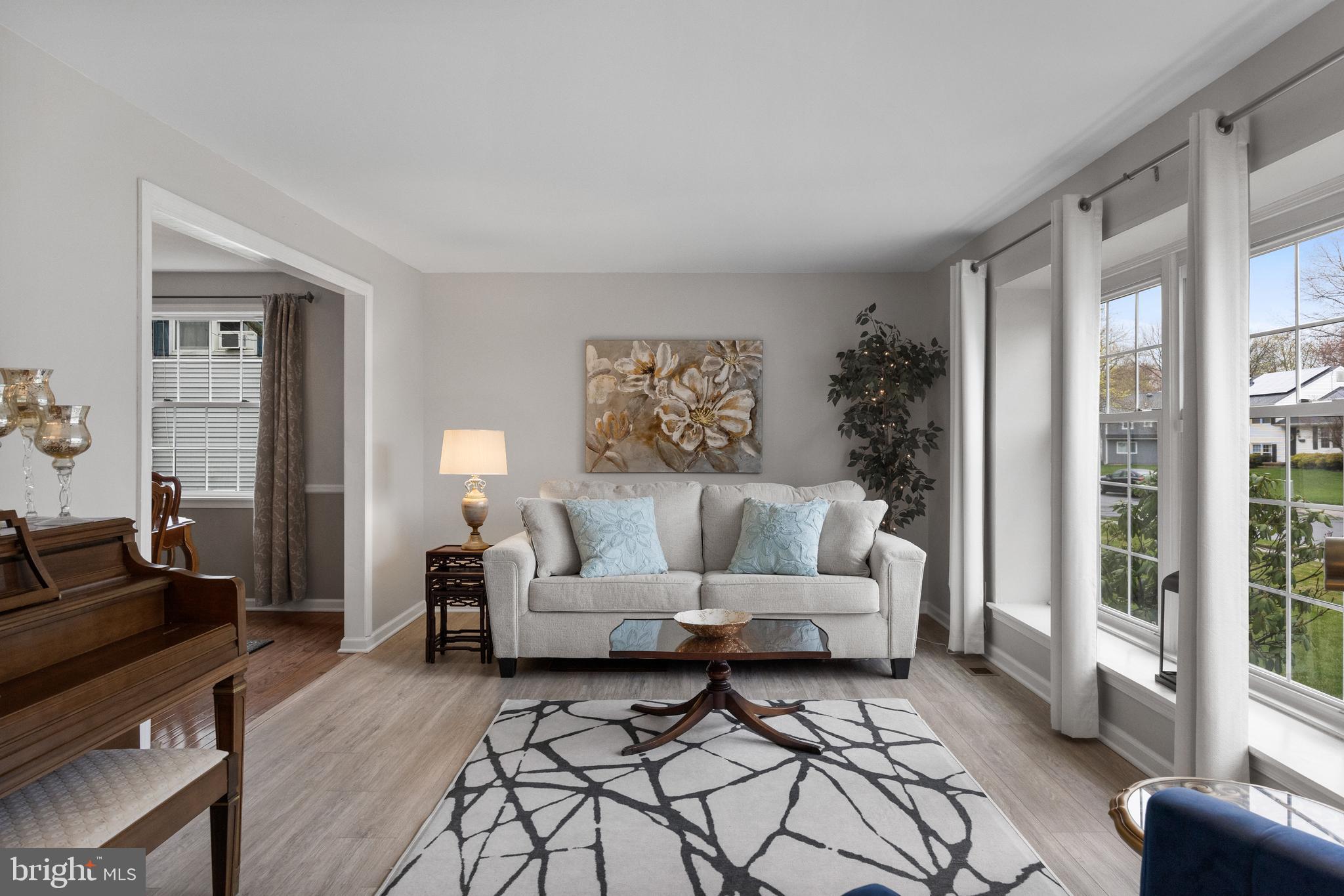 179 Forge Road Delran, NJ 08075 - Photo 7 of 35 a living room with furniture and a large window