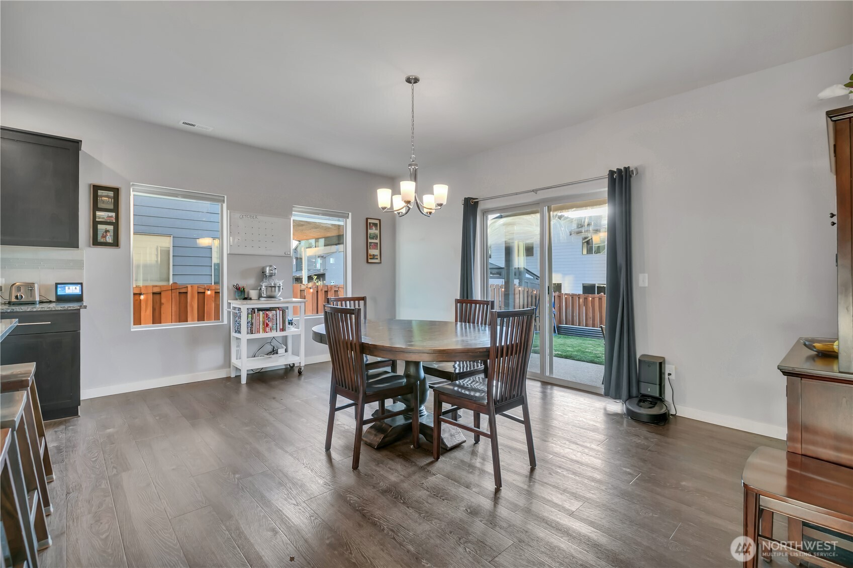 291 South Sergeant Street Buckley, WA 98321 - Photo 14 of 38 a view of a dining room with furniture window and wooden floor